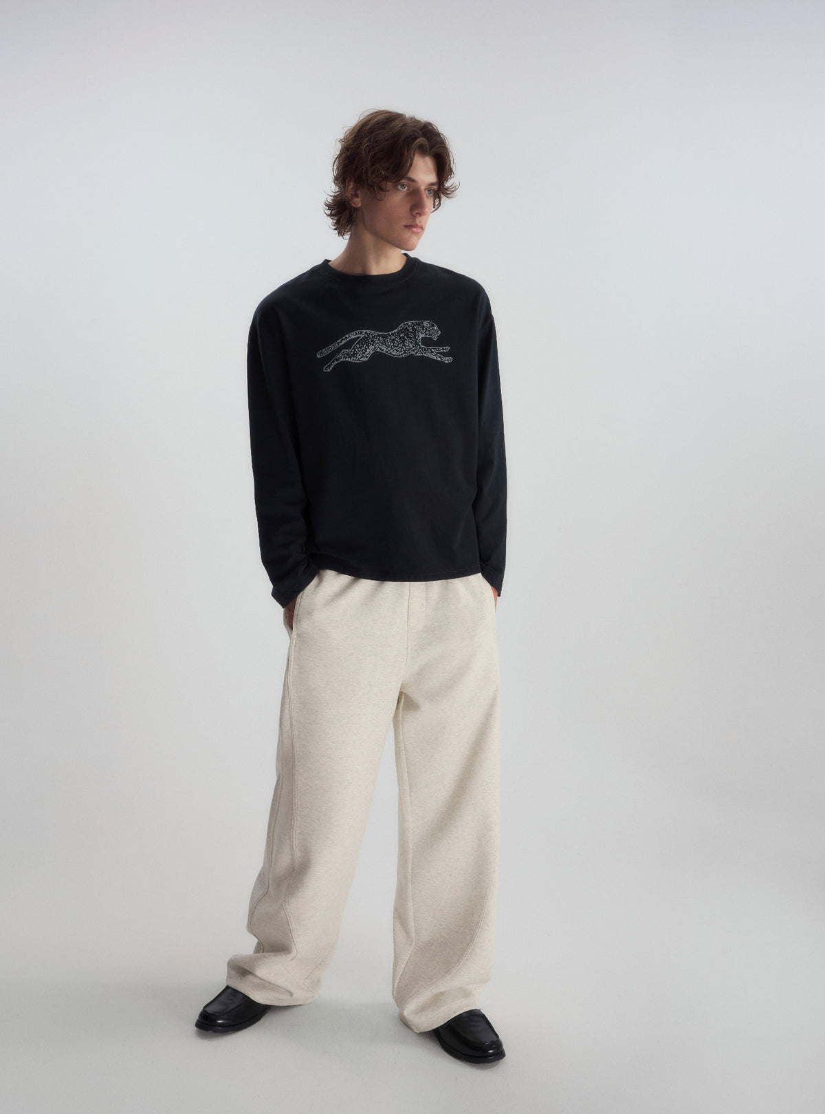 Curved Leg Relaxed Sweatpants